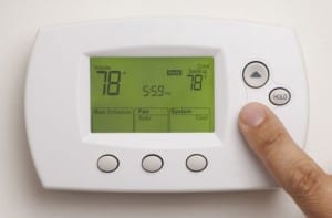 Digital Thermostat and Male Hand